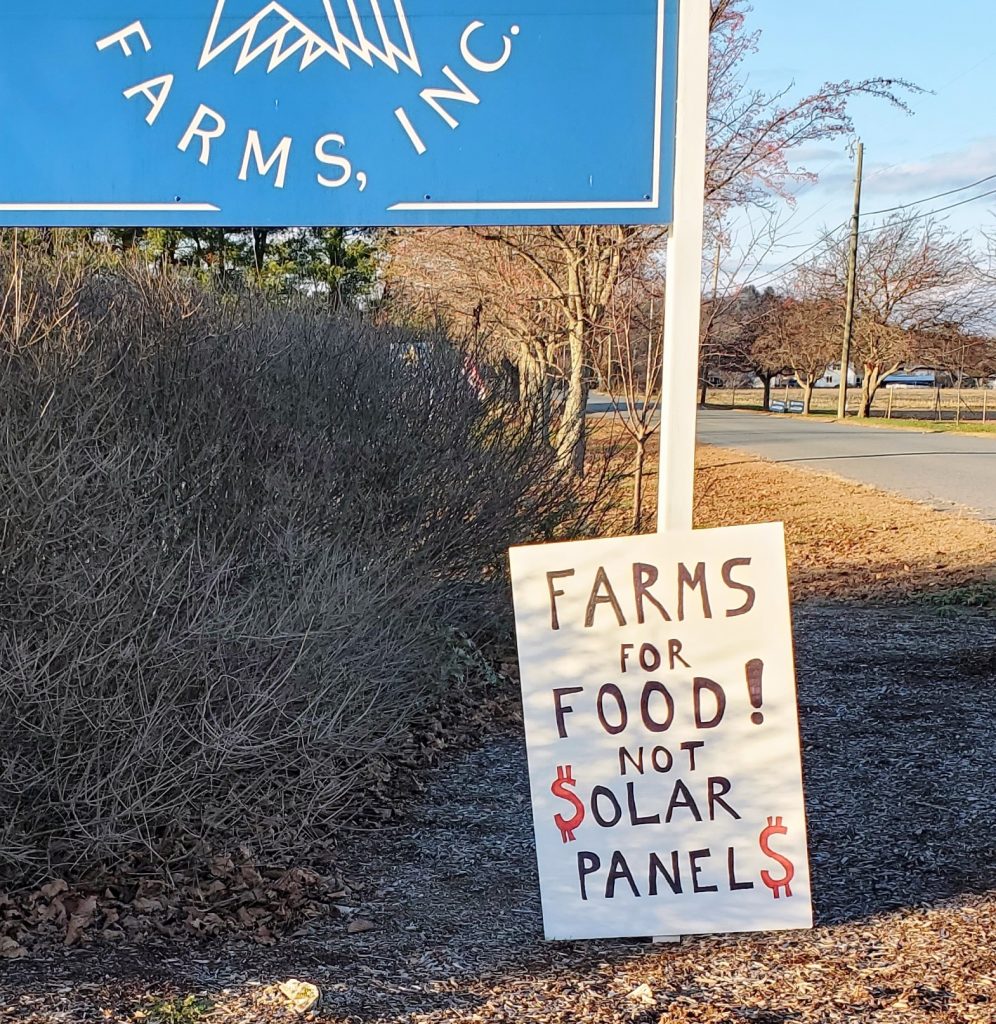 protest sign: Farms for Food not Solar Panels